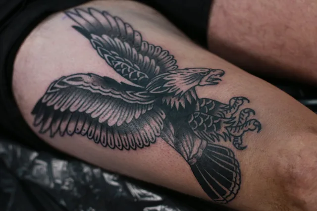 A traditional eagle on a thigh