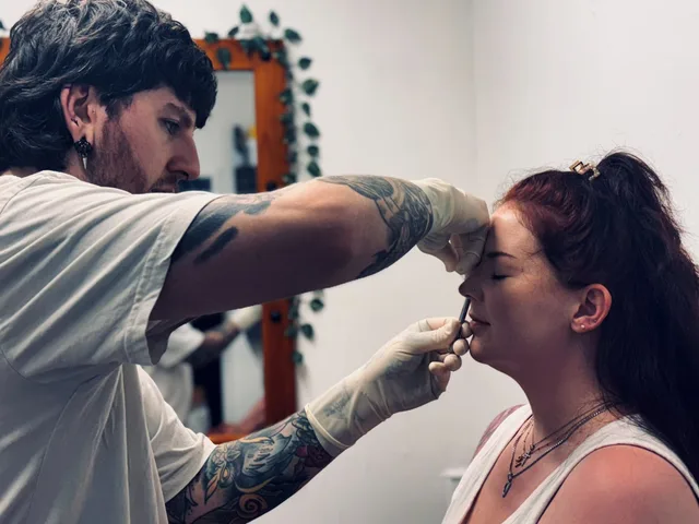 A nostril piercing being done